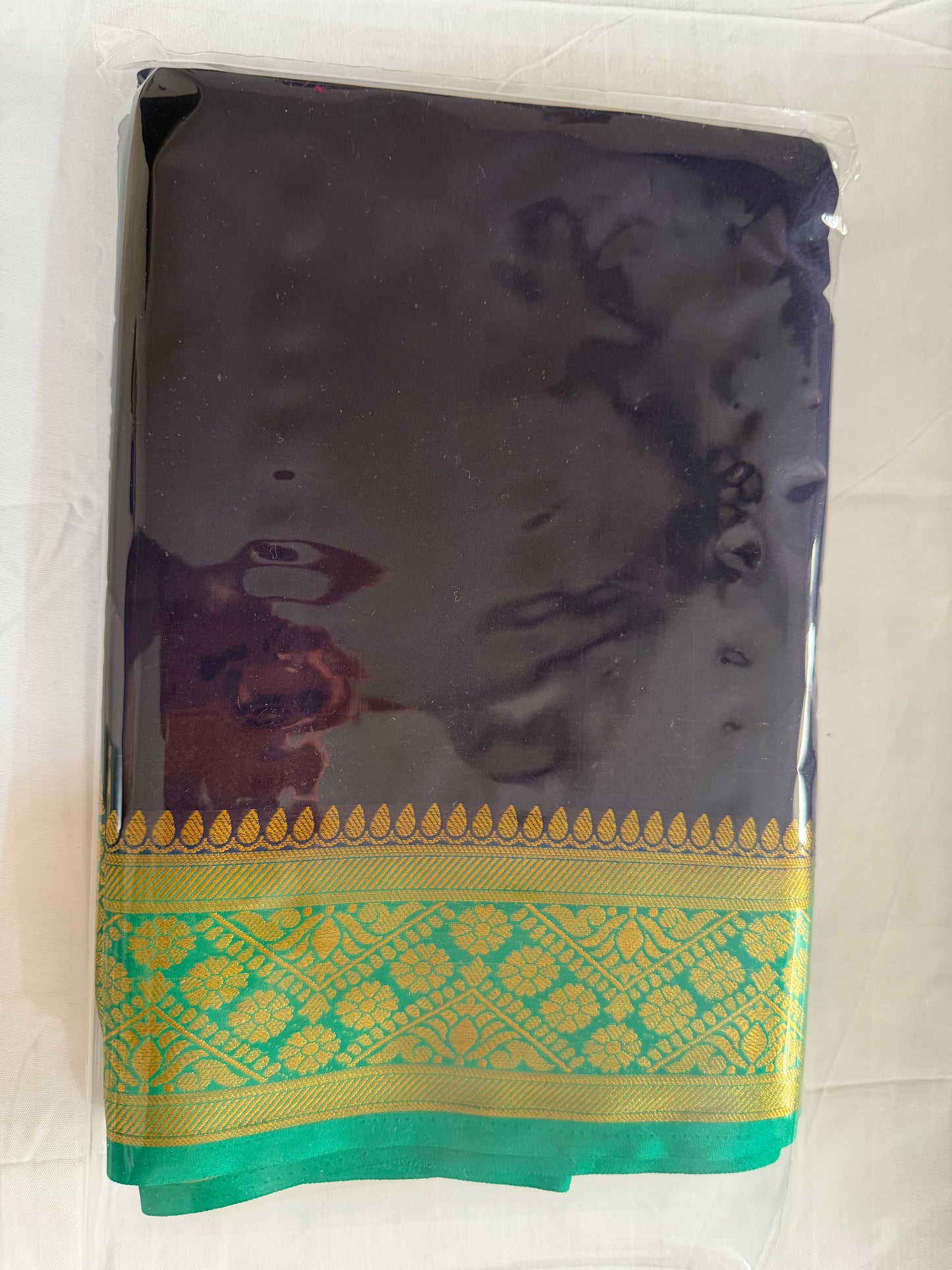 Mysore crep Semi soft silk 4- Blue with contract green boarder very beautiful and soft