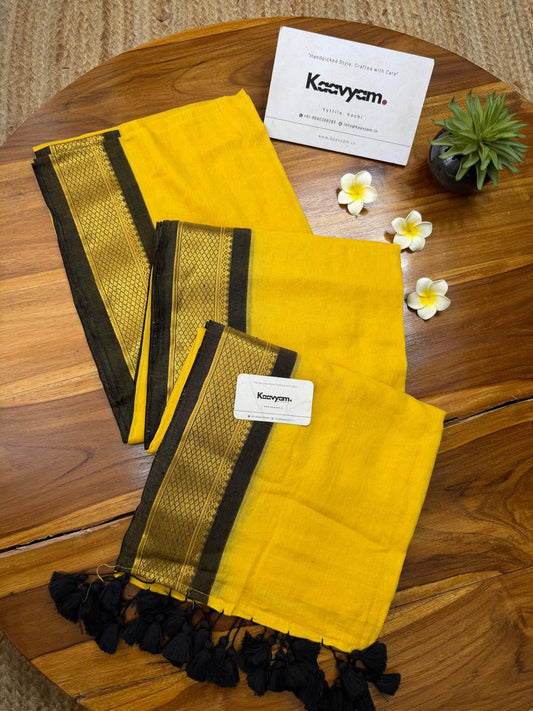Onam special saree Mulcotton ~ yellow saree with Kasav boarder