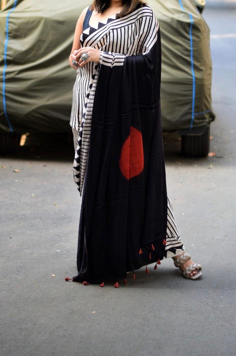 Gajji Modal silk- print white strip n black pallu