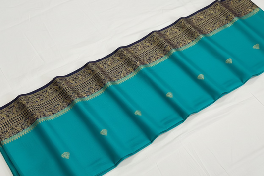 Semi soft Mysore crep silk saree with peacock design -1  light blue shade very soft silk with small buttes.