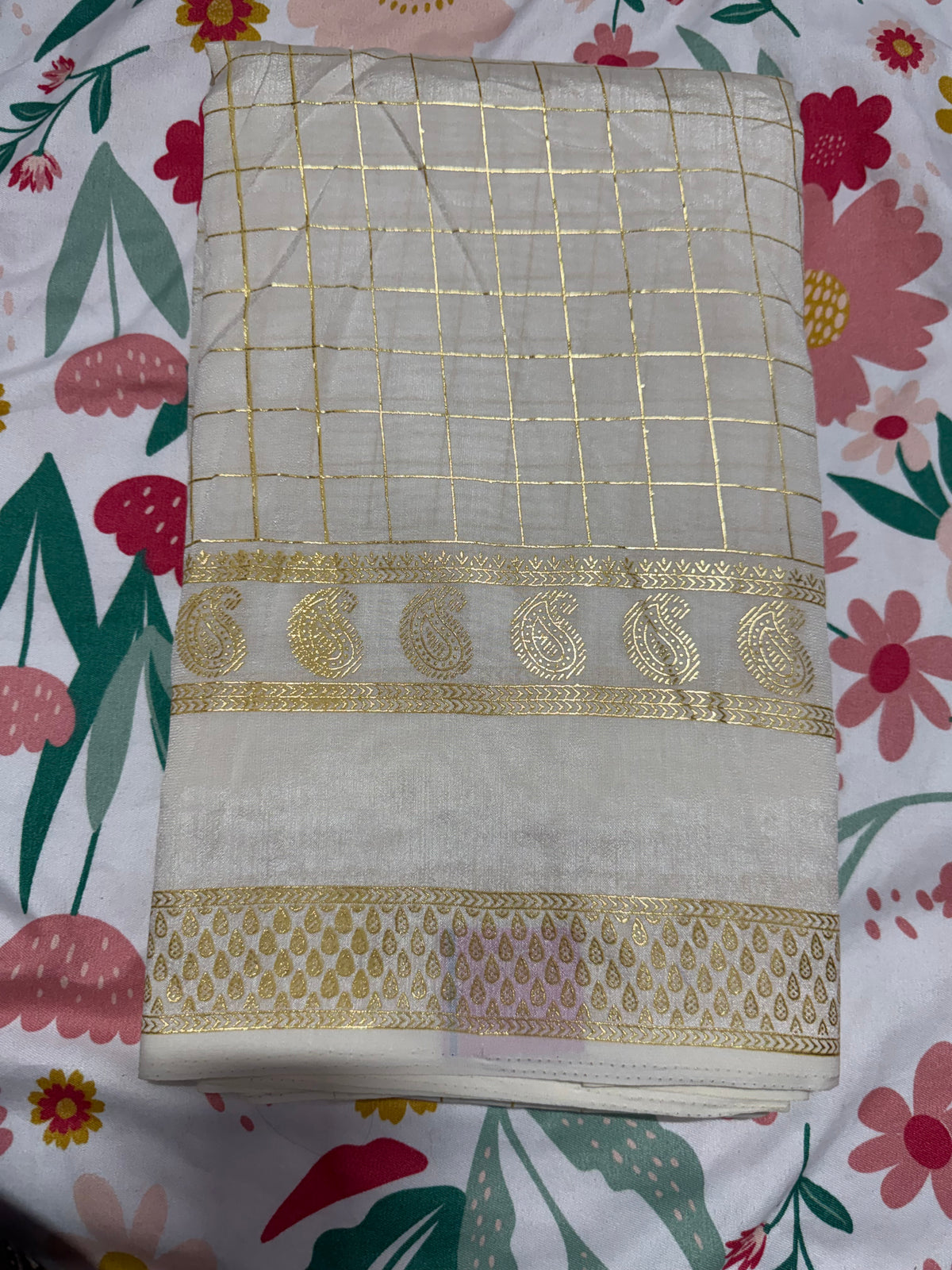 Light gold checks saree onam
