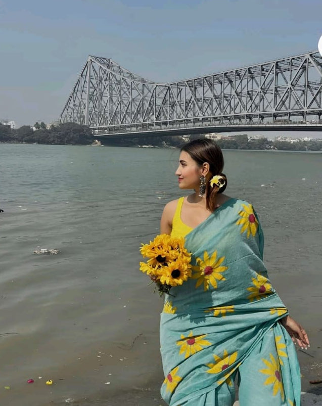 linen saree with sky blue sunflow flower design