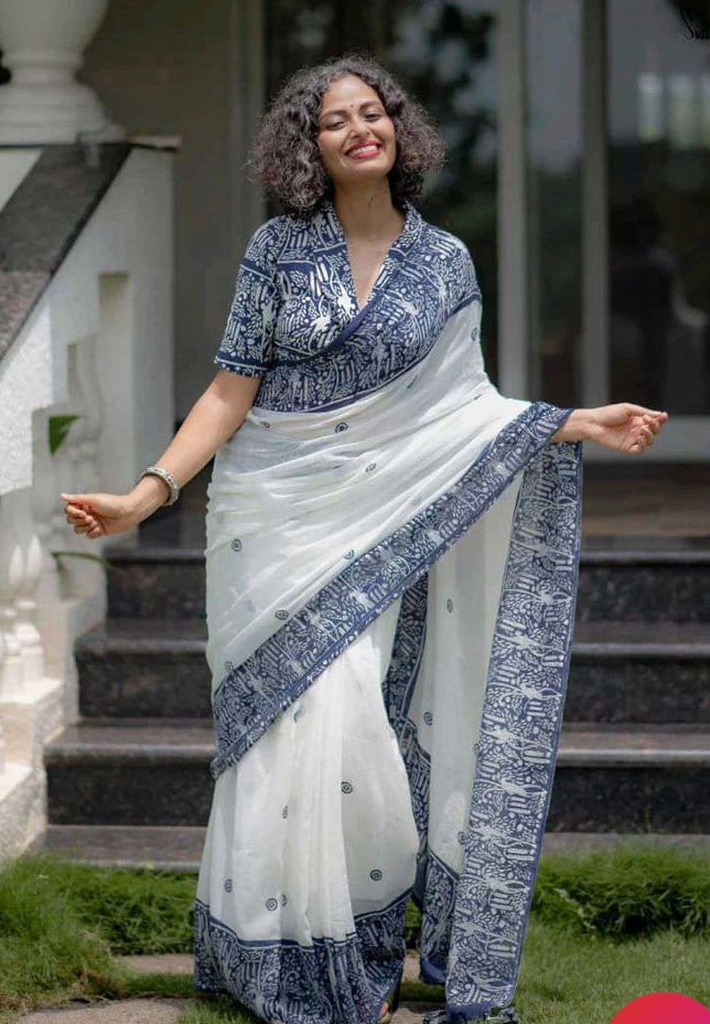 linen saree with saree with blue color flower buttus