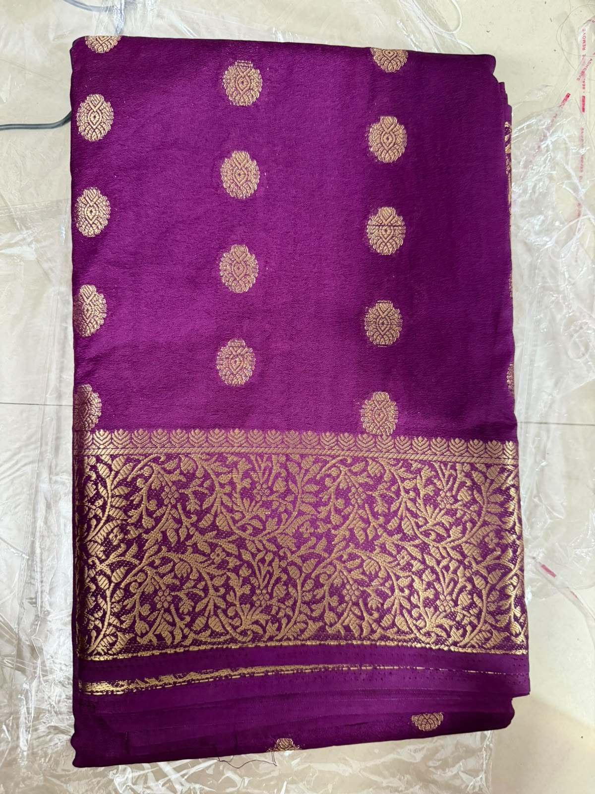 Saree -purple traditional ethnic fabric with golden boarder and golden buttas