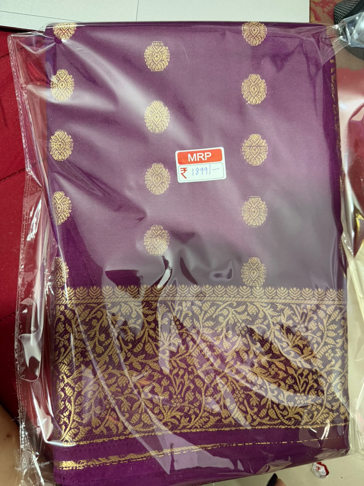 Saree -purple traditional ethnic fabric with golden boarder and golden buttas