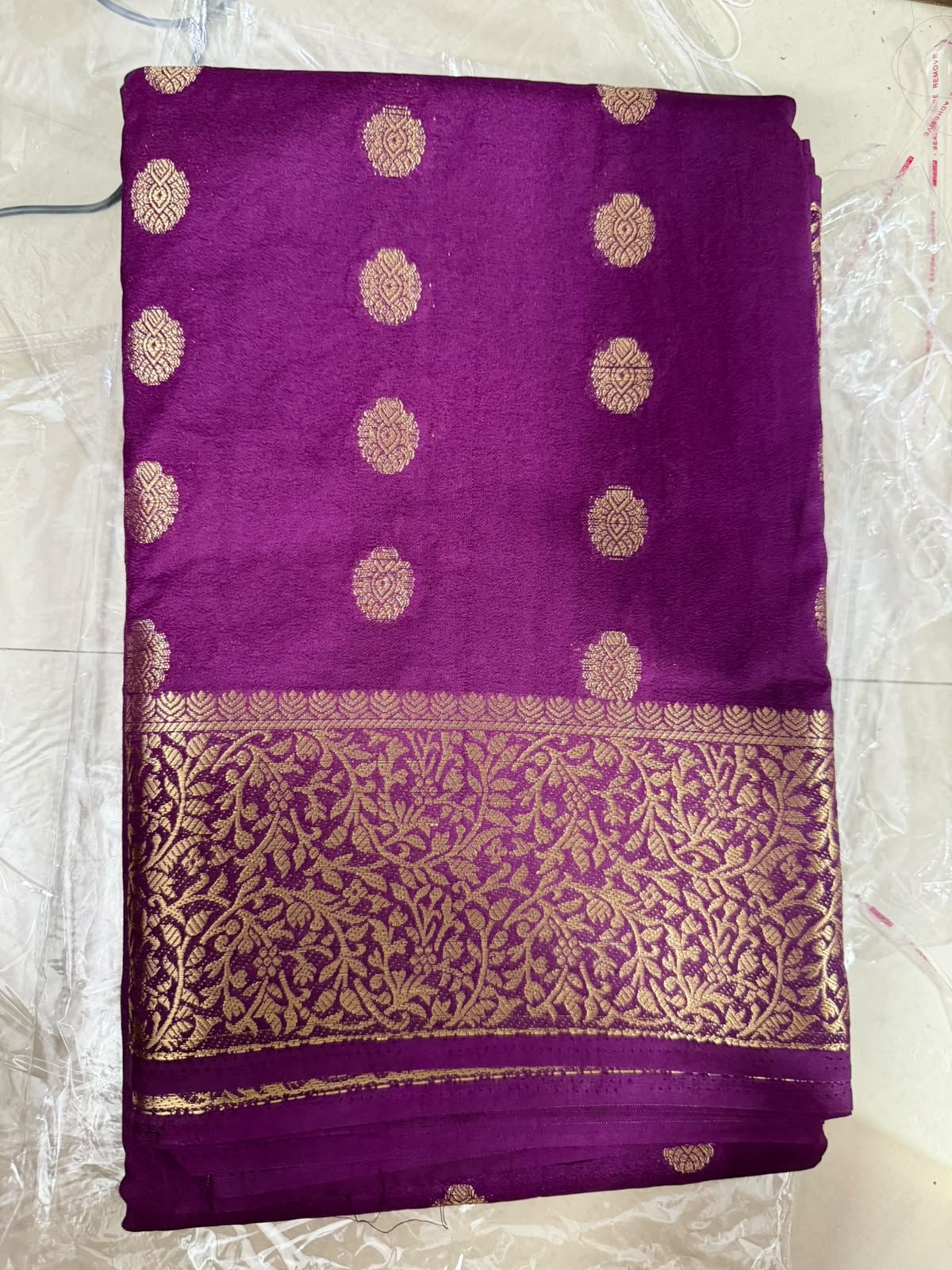 Saree -purple traditional ethnic fabric with golden boarder and golden buttas
