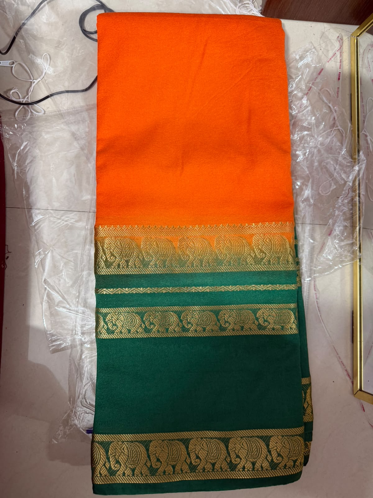 Semi-Crepe Silk Saree with Elephant Bentex Border | Contrast Color Designer Saree- Forest Green and Orange Saree with Traditional Elephant Bentex Border