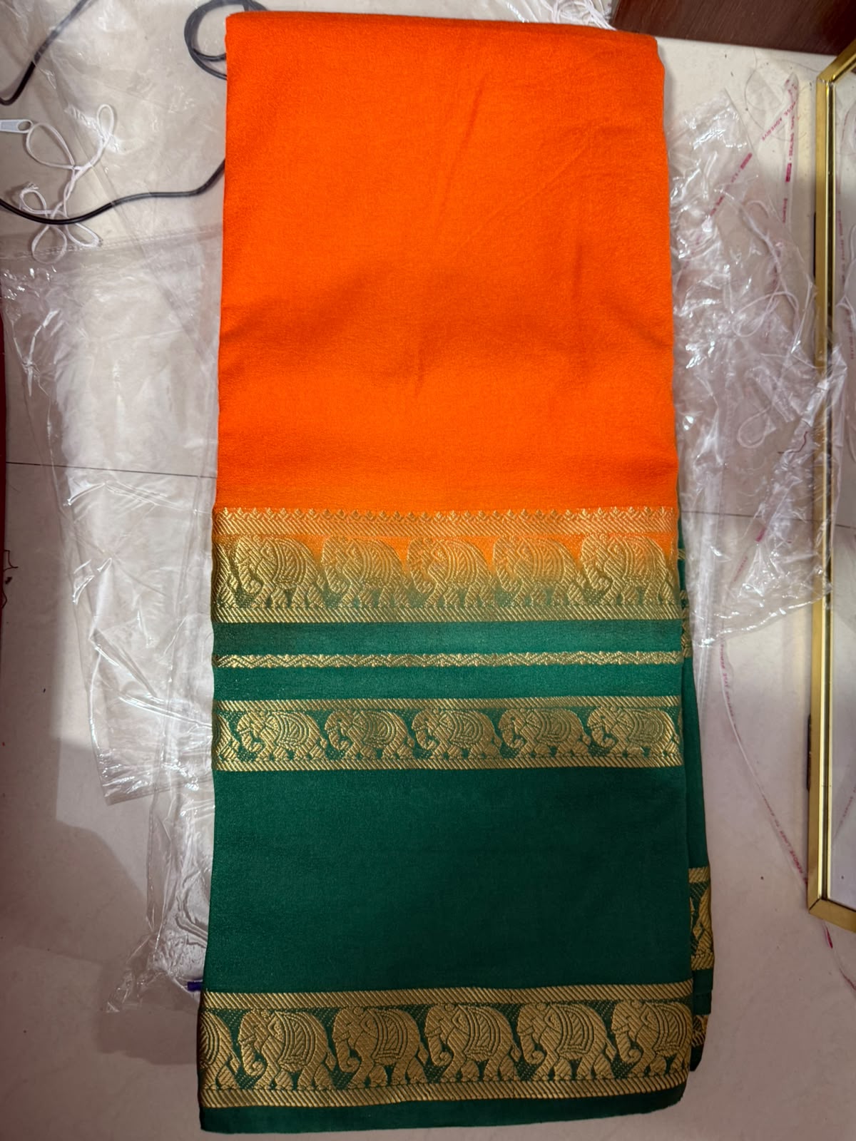 Semi-Crepe Silk Saree with Elephant Bentex Border | Contrast Color Designer Saree- Forest Green and Orange Saree with Traditional Elephant Bentex Border